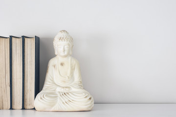 Buddha ornament book stop with copy space.