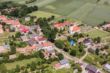Fototapeta na wymiar aerial view of the Ligota Wielka village and harvest fields