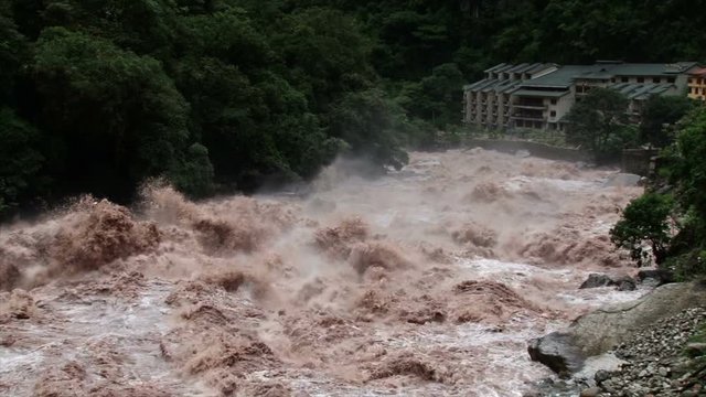 Slow motion shot of Urubamba River in full flood in Peru