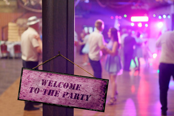 people dancing in the club or wedding reception