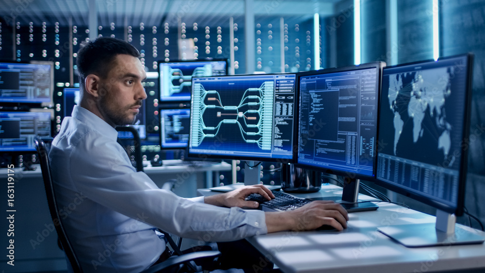 Poster System Security Specialist Working at System Control Center. Room is Full of Screens Displaying Various Information.