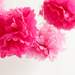 Paper flowers at the girl baby shower party.  Baby shower celebration concept