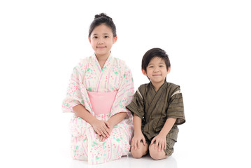 Asian children in Japanese Traditional Dress sitting