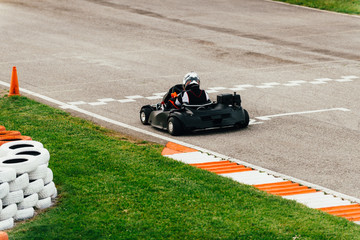 Woman driving go-cart