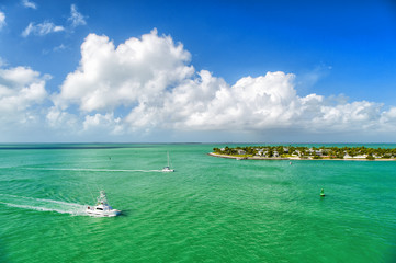 touristic yachts floating by green island at Key West, Florida