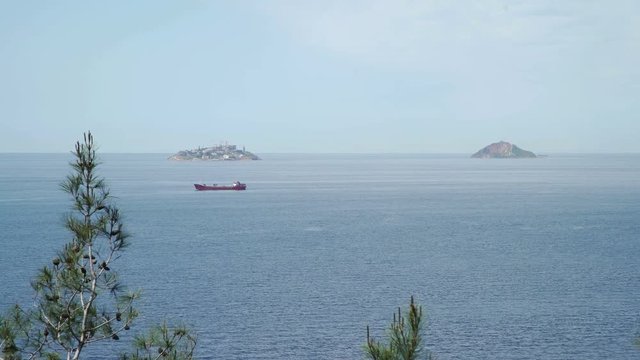 View from island on sea, ships