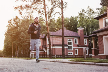 Fototapeta na wymiar Man running outdoors
