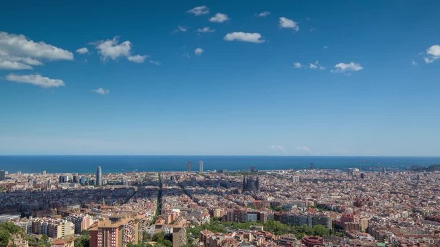 wide angle timelapse of barcelona shot from the bunkers de carmel offering amazing panoramic views over the city skyline