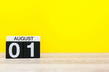 August 1st. Image of august 1, calendar on yellow background with empty space for text. Summer time