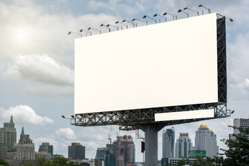 Road with lanterns and large blank billboard at evening in city : Bangkok : Thailand