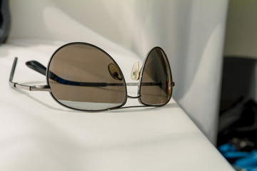 Black man sunglasses on white cloth background