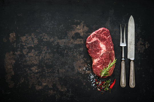 Raw dry aged beef ribeye steak