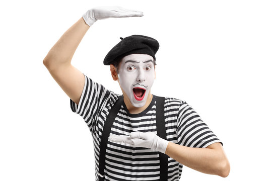 Mime artist gesturing with his hands