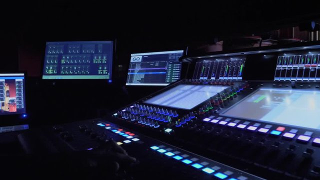 Operator in control room of a theater in a show 4