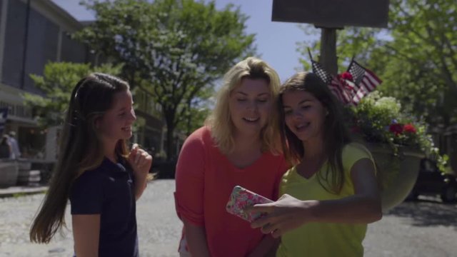 Girls Pose For A Selfie In Classic New England Rotary On Nantucket Island (Slow Motion) 