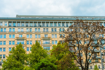 Obraz premium orange facaded apartment house at berlin