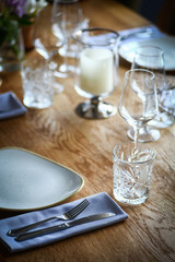 Knives, forks and plates on a table