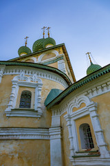 Fototapeta na wymiar UGLICH, RUSSIA - JUNE 17, 2017: Facade of the Church of the Nativity of John the Baptist on the Volga River. Built in 1691 