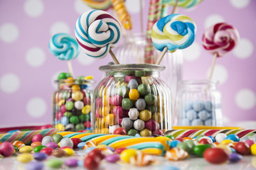 Fototapeta na wymiar Candy colorful sweets and lollipops and gum balls