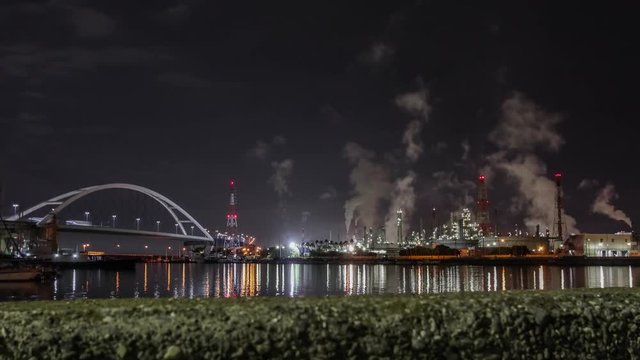 Night view of industrial area and expressway on the coastal area