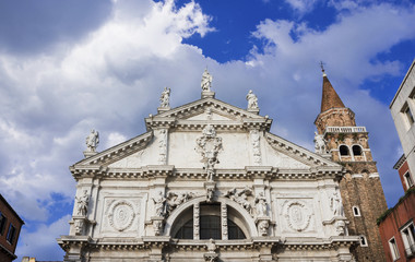 Fototapeta na wymiar San Moise baroque church with clouds in Venice