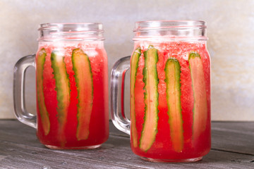 Watermelon and cucumber cocktail in jars