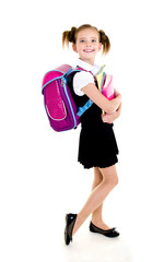 Portrait of smiling happy school girl child with backpack