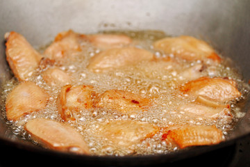 Homemade cooking of deep fried chicken wings.