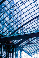 Fototapeta premium View of a modern glass skyscraper buildings around