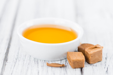 Syrup (Caramel taste) (selective focus, close-up shot)