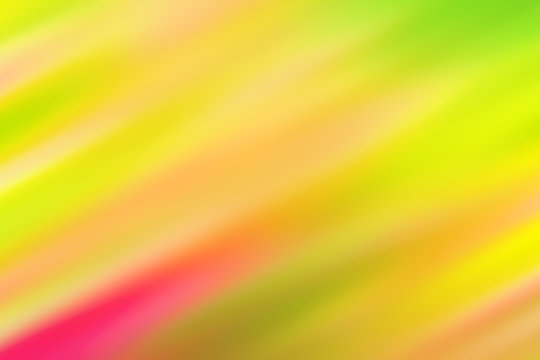 Blurred green background with colored diagonal stripes and spots