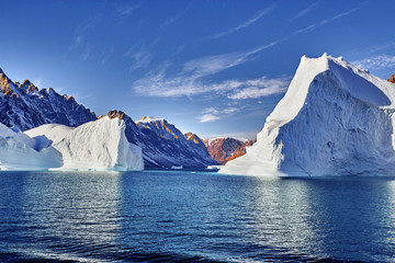 iceberg floating in greenland fjord
