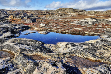 pool of water in greenland fjord