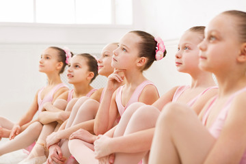 Little ballerinas in ballet studio © Prostock-studio