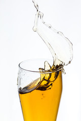 Splashing beer from a glass