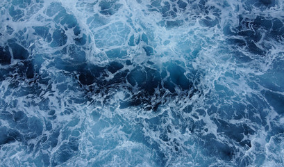 Fototapeta na wymiar blue sea water foam waves