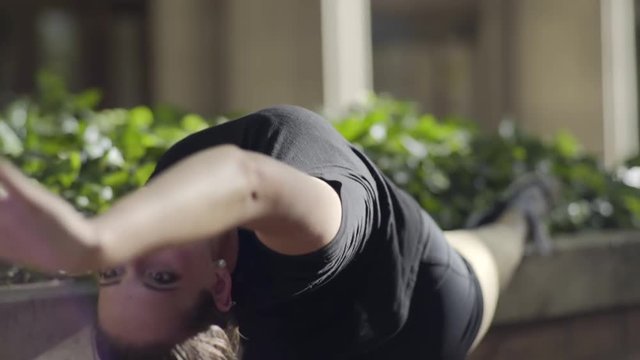 Beautiful Ballet Dancer Uses Wall In Park To Stretch (Slow Motion)