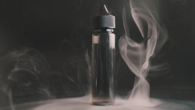 Cinemagraph Loop 60ml Vape Liquid Juice Bottle Surrounded by a Tornado Smoke
