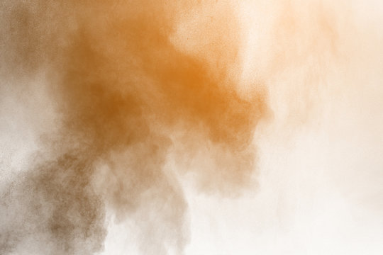 Freeze motion of colored powder explosion isolated on white background.