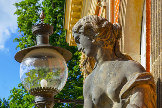 Berlin, Postdam, New Palace :woman Statue And Street Lamp