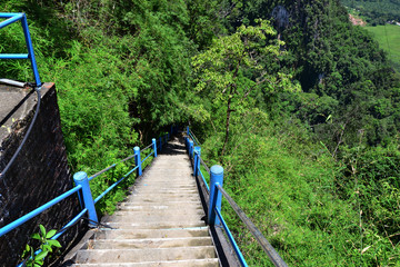 Ladder down Wat Tham Suea, Krabi province, Thailand - September 2014