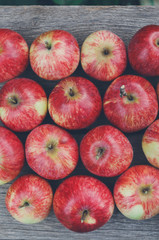Sweet fresh ripe red apple harvest background