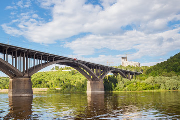 Fototapeta na wymiar Summer view of the Molitovsky bridge from the river in Nizhny Novgorod
