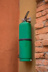 Fire tank hang on brick wall
