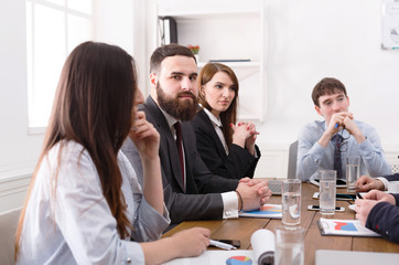 Business meeting. Young businessmen in office