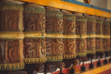 Tibetan metal prayer wheels with mantras