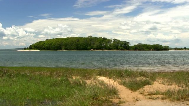 Puffy clouds over Toby's island Cape Cod