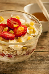 oatmeal porridge with strawberry and banana in a bowl