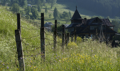 Old house on the slope of the valley