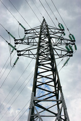 Transmission power tower electricity pylon . Steel lattice tower used to support an overhead power line